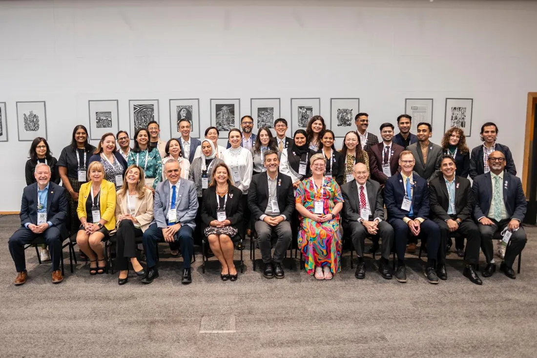 A group photograph of fellows at a dental congress