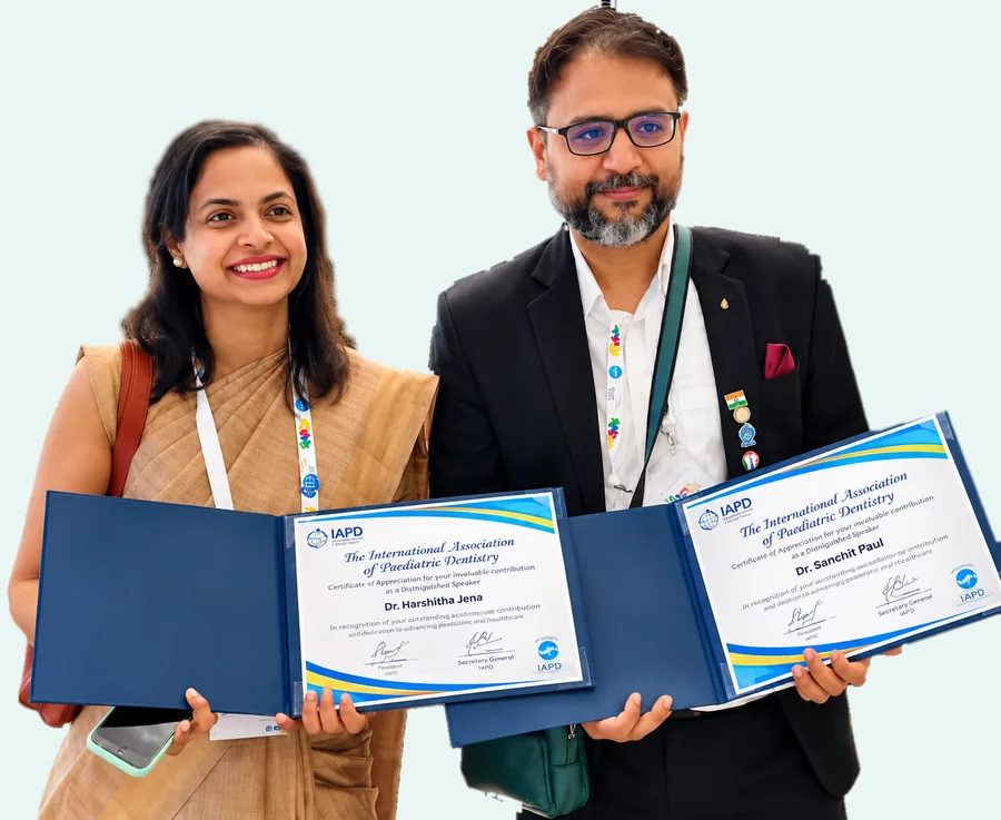 Dr. Sanchit Paul holding the IAPD Certificate of Appreciation as a Distinguished Speaker