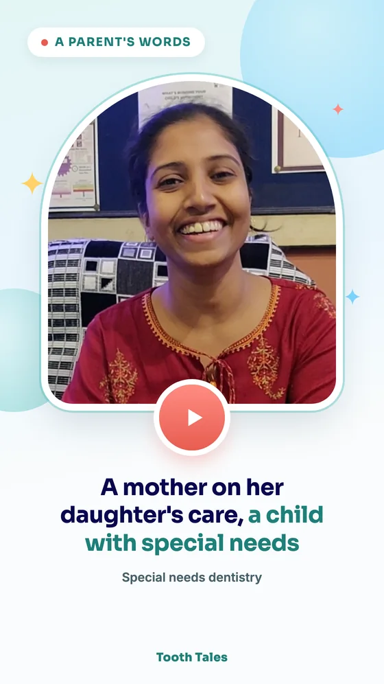 A smiling mother seated at the clinic